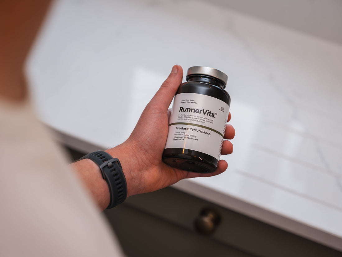 Runner holding a RunnerVits bottle in a kitchen